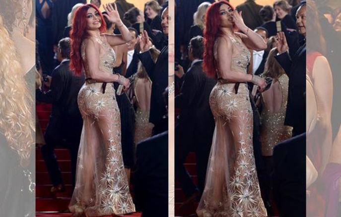 Красными волосами и прозрачным платьем отметилась Хайфа Вахби на Каннском кинофестивале
